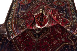 Close-up detail of 2000s Shiraz rug from Iran / Persia showing Wool weave