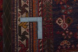 Surface texture of 2000s Shiraz rug with natural Wool and intricate pattern