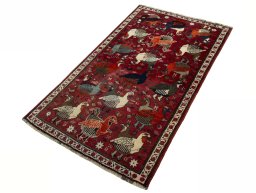 Corner detail of 2000s Shiraz rug showing border pattern and Wool pile