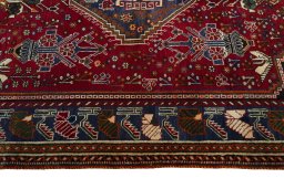 Corner detail of 2000s Shiraz rug showing border pattern and Wool pile