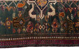 Close-up detail of 2000s Shiraz rug from Iran / Persia showing Wool weave