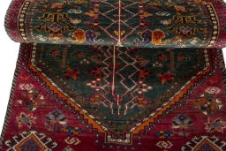 Full view of 2000s Shiraz rug from Iran / Persia, 137 × 80 cm in Green tones