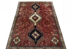 Surface texture of 2000s Shiraz rug with natural Wool and intricate pattern