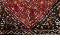 Close-up detail of 2000s Shiraz rug from Iran / Persia showing Wool weave