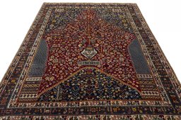 Surface texture of 2000s Shiraz rug with natural Wool and intricate pattern