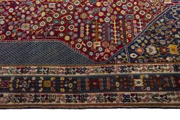 Full view of 2000s Shiraz rug from Iran / Persia, 293 × 210 cm in Red tones