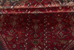 Corner detail of 1970s Shiraz rug showing border pattern and Wool pile