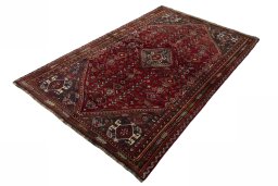 Corner detail of 1970s Shiraz rug showing border pattern and Wool pile
