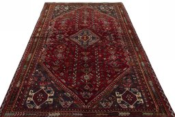 Surface texture of 1970s Shiraz rug with natural Wool and intricate pattern