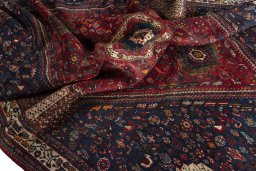 Corner detail of 1970s Shiraz rug showing border pattern and Wool pile