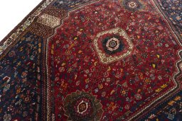 Surface texture of 1970s Shiraz rug with natural Wool and intricate pattern