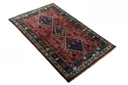 Close-up detail of 2000s Shiraz rug from Iran / Persia showing Wool weave