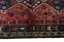 Close-up detail of 2000s Shiraz rug from Iran / Persia showing Wool weave