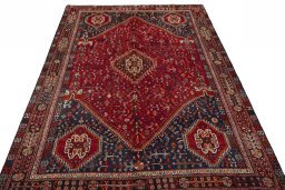 Surface texture of 1970s Shiraz rug with natural Wool and intricate pattern