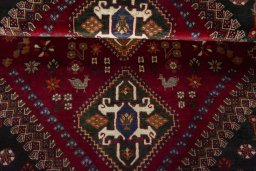 Full view of 2000s Shiraz rug from Iran / Persia, 181 × 122 cm in Red tones