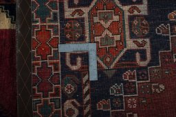 Close-up detail of 2000s Shiraz rug from Iran / Persia showing Wool weave