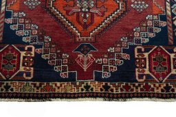 Central medallion detail of 2000s Shiraz rug from Iran / Persia