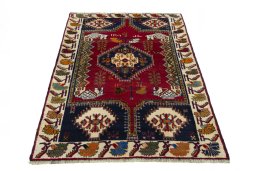 Surface texture of 2000s Shiraz rug with natural Wool and intricate pattern