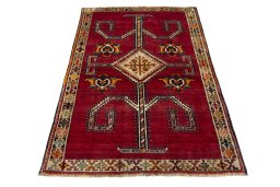 Surface texture of 2000s Shiraz rug with natural Wool and intricate pattern