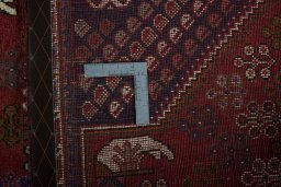 Surface texture of 2000s Shiraz rug with natural Wool and intricate pattern