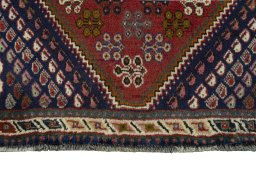 Close-up detail of 2000s Shiraz rug from Iran / Persia showing Wool weave