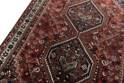 Backside of handmade 2000s Shiraz rug showing knot structure and weave density