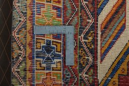 Surface texture of 2000s Shiraz rug with natural Wool and intricate pattern