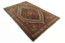 Close-up detail of 2000s Shiraz rug from Iran / Persia showing Wool weave