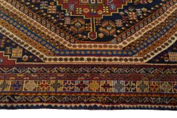 Full view of 2000s Shiraz rug from Iran / Persia, 275 × 174 cm in Multi Color tones