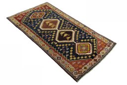 Close-up detail of 2000s Shiraz rug from Iran / Persia showing Wool weave