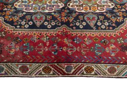 Close-up detail of 2000s Shiraz rug from Iran / Persia showing Wool weave