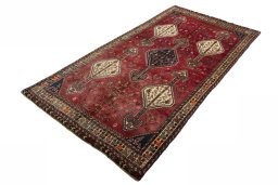 Corner detail of 1970s Shiraz rug showing border pattern and Wool pile