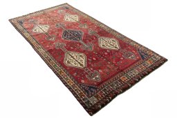 Close-up detail of 1970s Shiraz rug from Iran / Persia showing Wool weave