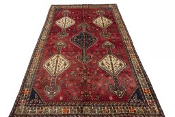 Surface texture of 1970s Shiraz rug with natural Wool and intricate pattern