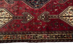 Close-up detail of 1970s Shiraz rug from Iran / Persia showing Wool weave