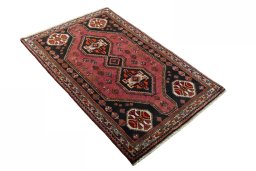 Close-up detail of 2000s Shiraz rug from Iran / Persia showing Wool weave