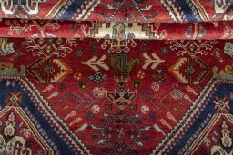 Corner detail of 2000s Shiraz rug showing border pattern and Wool pile