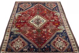 Surface texture of 2000s Shiraz rug with natural Wool and intricate pattern