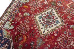 Backside of handmade 2000s Shiraz rug showing knot structure and weave density