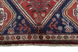 Close-up detail of 2000s Shiraz rug from Iran / Persia showing Wool weave