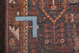 Surface texture of 2000s Shiraz rug with natural Wool and intricate pattern