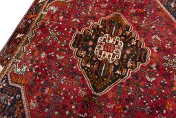 Backside of handmade 2000s Shiraz rug showing knot structure and weave density