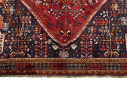 Close-up detail of 2000s Shiraz rug from Iran / Persia showing Wool weave
