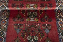 Corner detail of 2000s Shiraz rug showing border pattern and Wool pile