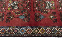 Full view of 2000s Shiraz rug from Iran / Persia, 185 × 105 cm in Red tones