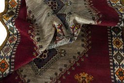 Corner detail of 2000s Shiraz rug showing border pattern and Wool pile