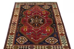 Surface texture of 2000s Shiraz rug with natural Wool and intricate pattern