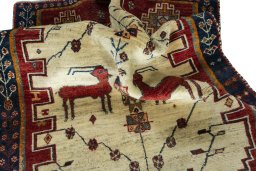 Corner detail of 2000s Shiraz rug showing border pattern and Wool pile