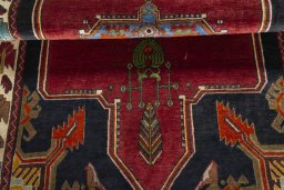 Corner detail of 2000s Shiraz rug showing border pattern and Wool pile