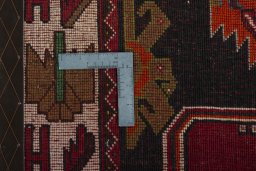 Surface texture of 2000s Shiraz rug with natural Wool and intricate pattern